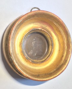 Coin showing head of David Garrick